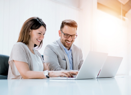 A doctor is using his laptop for IT services